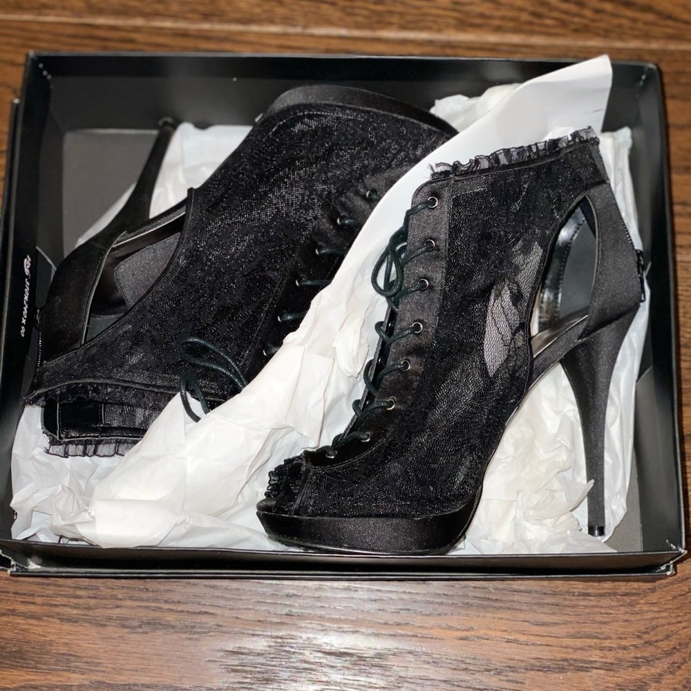 Black heels by Michael Shannon